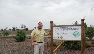 Nathan Garza at the St. John’s Parkway Garden. The garden is one of four set up in the city to educate residents.