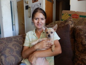 Abigail Trevino and her dog, Ducky (pronounced ‘dukey’), relaxing in her home on Monte Vista Avenue.