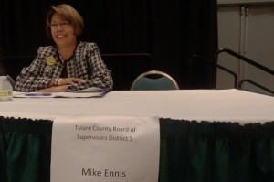 Virginia Gurrola, Tulare County Board of Supervisors candidate, sits next to an empty chair reserved for heropponent, Mike Ennis.