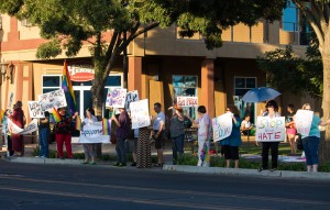 Protesters assemble across from the Porterville City Council chambers.