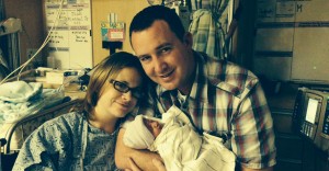 Devon Mathis, his wife, and their new baby girl.