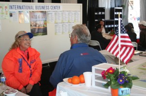 Volunteer greeters chat in the International Business Center while visiting foreign nationals dine, chat and regroup in the background. The Center’s goal is pair potential buyers and sellers, as well as providing meeting spaces and translation services during the 2015 World Ag Expo at the International Agri-Center in Tulare last week.