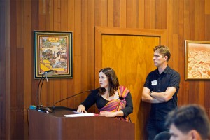 Gingi and Jonathan Freeman with their two month old speaking in front of the city council.