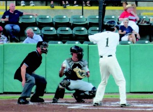 Umpire Chris Graham calls balls and strikes behind the plate during a Visalia Rawhide-San Jose Giant game last week at Rawhide Stadium. Graham is part of a two-man umpire team with Jeff Gorman, who was working the field that night. Photo: Nancy Vigran