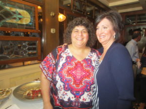 Amy Shuklian and her campaign manager Karen Tellalian celebrated with supporters at the Vintage Press on Tuesday night.