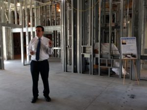 Healthcare Conglomerate Associates CEO Benny Benzeevi speaks to the  assembled press about the Tulare Regional Medical Center Tower One construction.
