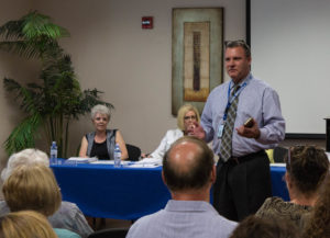 Shawn Burgess, the CIO for Healthcare Conglomerate Associates, speaks at the August 24 TLHCD Board meeting.