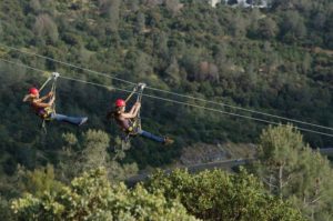 Let your hair flow in the wind while you zipline! Cave & Mine Adventures offers twin zip lines. Courtesy/Jason Smith/Cave & Mine Adventures
