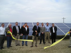 Attending the ribbon-cutting ceremony are (left to right): D.E. Shaw & Co. Senior Vice President Erich Mettler, Tulare County RMA Director Jake Raper, Tulare County Administrative Officer Jean Rousseau, Tulare County Economic Development Manager Michael Washam, Tulare County Supervisor Steve Worthley, ImMODO Vice President Jon Rappe, ImMODO Senior Development Specialist Daniel Serber and ImMODO Owner/CEO Jose Luis Moya. (Photo by Steve Pastis)