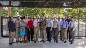 Members of the EDC Board of Directors pose with Brett Doney following the presentation of the AEDO recognition. From left to right: Monte Reyes, City of Porterville; Dan Zoldak, Lars Andersen; Dr. Rosa Carlson, Porterville College; Colby Wells, Southern California Gas Company; Mike Porte, Newmark Grubb Pearson Commercial; EDC Board Chair Craig Vejvoda, City of Tulare; Brett Doney, president and CEO, Great Falls Development Authority representing the International Economic Development Council; EDC Immediate Past Chair Nick Seals, Seals/Biehle, Inc.; Harroll Wiley, Bank of the Sierra; Leonel Benavides, City of Farmersville; John Lollis, City of Porterville; Mike Olmos, City of Visalia; and George Vasquez, Rabobank.