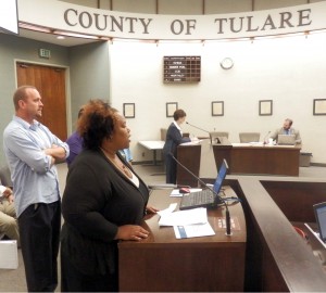 Teneya Johnson, an SEIU organizer, encourages the board to not file charges against SEIU and try to repair relations. Kathleen Bales-Lange, county counsel, pictured in the background, said she has heard that all before.