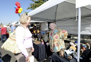 Local artist Marn Reich (at right) showcases her work at last year’s Taste the Arts.
