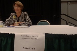 Virginia Gurrola, Tulare County Board of Supervisors candidate, sits next to an empty chair reserved for heropponent, Mike Ennis.