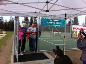 Cutting the ribbon to open Visalia’s new pickleball courts are (l-r): Jill Dembroff, “Voice of Pickleball in Visalia” Glenn Dembroff, Visalia Vice Mayor Warren Gubler and the city’s pickleball coach Dan Fox.