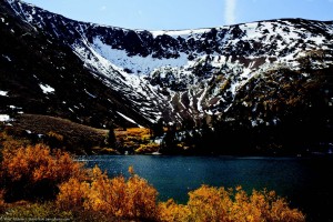 Morning light streams across 13,000-foot Mt. Emerson in the Inyo National Forest in this photo taken at North Lake, west of Bishop near Aspendell in Bishop Canyon, while aspens show off their reds and golds in the foreground. The Eastern Sierra offers a range of fall colors from September through December, drawing eager visitors to the area. Photo by Pacheco, flickr.com/photos/pachecophotography